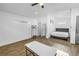 Bright bedroom features wood-look floors, modern decor, and a comfortable bed at 712 43Rd N Ave, St Petersburg, FL 33703