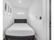 Cozy bedroom with a modern bed, minimalist decor, and a window for natural light at 712 43Rd N Ave, St Petersburg, FL 33703