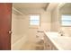 Well-lit bathroom with modern fixtures and neutral color palette at 1001 Brookside Dr, Clearwater, FL 33764