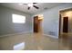 Large bedroom featuring sleek floors and closet at 1001 Brookside Dr, Clearwater, FL 33764