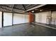 Spacious garage with ample storage cabinets and water heater at 1001 Brookside Dr, Clearwater, FL 33764