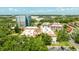 Aerial view of condominium building, showcasing the roof and surrounding landscaping at 1012 Pearce Dr # 304, Clearwater, FL 33764