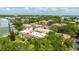 Scenic aerial view of the condo complex surrounded by lush greenery and mature trees at 1012 Pearce Dr # 304, Clearwater, FL 33764