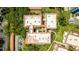 Aerial view of the condo's rooftops, showing the unique layout and surrounding greenery at 1012 Pearce Dr # 304, Clearwater, FL 33764