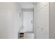 Bright foyer with shoe storage, white closets, and a clean, modern design at 1012 Pearce Dr # 304, Clearwater, FL 33764