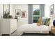Serene bedroom showcasing a dresser, bed, and themed decor with natural light at 10242 Gentle Rain Dr, Land O Lakes, FL 34638