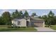 Charming single-Gathering home featuring a two-car garage, well-maintained lawn, and inviting curb appeal at 10242 Gentle Rain Dr, Land O Lakes, FL 34638
