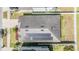 Birds-eye view of house with solar panels, manicured landscaping, and a well-maintained roof at 11922 Winterset Cove Dr, Riverview, FL 33579