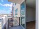 Balcony view featuring the exterior building's architecture, skyline, and access to the interior at 1208 E Kennedy Blvd # 1121, Tampa, FL 33602
