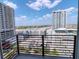 Balcony view of the city skyline showcasing nearby buildings and clear skies at 1208 E Kennedy Blvd # 1121, Tampa, FL 33602