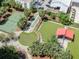 Aerial shot of community amenities including tennis court, shuffleboard, dog run, and picnic area at 1208 E Kennedy Blvd # 1121, Tampa, FL 33602