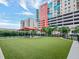 A great outdoor space for dogs with a shaded area and room to run at 1208 E Kennedy Blvd # 1121, Tampa, FL 33602