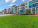 Beautiful building exterior with a sprawling green lawn at 1208 E Kennedy Blvd # 1121, Tampa, FL 33602