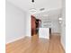 Spacious living area seamlessly connects to the modern kitchen, with sleek hardwood floors throughout at 1208 E Kennedy Blvd # 1121, Tampa, FL 33602