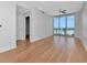 Well-lit living room with hardwood floors and large windows offering pleasant views at 1208 E Kennedy Blvd # 1121, Tampa, FL 33602