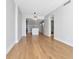 Open-concept living space featuring modern hardwood floors and flowing layout to the kitchen at 1208 E Kennedy Blvd # 1121, Tampa, FL 33602
