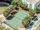 Aerial view of the community's shuffleboard and tennis courts surrounded by manicured landscaping at 1208 E Kennedy Blvd # 1121, Tampa, FL 33602