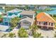 Aerial view of the homes showing the neighborhood with the canal and the unique architectural style at 12312 Lagoon Ln, Treasure Island, FL 33706