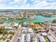 Picturesque aerial view of waterfront homes nestled along tranquil canals in a vibrant community at 12312 Lagoon Ln, Treasure Island, FL 33706
