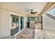 Covered outdoor kitchen with stainless steel grill, counter space, and tiled backsplash, perfect for entertaining at 12312 Lagoon Ln, Treasure Island, FL 33706