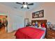 A bedroom with a closet and plenty of decor on the night stands at 1301 Flaxwood Ave, Brandon, FL 33511