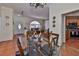 Bright dining room with an open layout, connecting the kitchen and living room for easy entertaining at 1301 Flaxwood Ave, Brandon, FL 33511