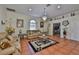 Spacious living room with neutral tones, decorative accents, and comfortable seating at 1301 Flaxwood Ave, Brandon, FL 33511