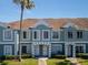 Charming townhome exterior with well-maintained landscaping, decorative trim, and inviting entrances at 1304 Kelridge Pl, Brandon, FL 33511