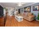 Inviting living room featuring hardwood floors, comfortable seating, and stylish decor at 1304 Kelridge Pl, Brandon, FL 33511