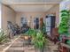 Serene sunroom with wood-look tile, ample seating, and plenty of natural light at 1304 Kelridge Pl, Brandon, FL 33511