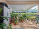 Bright sunroom filled with plants, creating a relaxing and inviting atmosphere at 1304 Kelridge Pl, Brandon, FL 33511