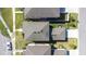 An aerial view of neighborhood homes showcasing similar rooflines and well-manicured lawns and proximity to each other at 13319 Dorado Shores Ave, Riverview, FL 33579