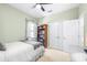 Comfortable bedroom with a ceiling fan, and closet at 13319 Dorado Shores Ave, Riverview, FL 33579