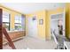 Bright bedroom featuring a charming window view, double door closet, and neutral carpeting at 13319 Dorado Shores Ave, Riverview, FL 33579