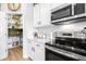 Contemporary kitchen with stainless steel appliances and easy access to the walk-in pantry for convenient storage at 13319 Dorado Shores Ave, Riverview, FL 33579