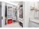 Large walk-in closet with custom shelving, drawers, and ample storage for clothes and shoes at 13319 Dorado Shores Ave, Riverview, FL 33579