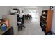 Spacious flex room with access to the dining area and featuring a desk, shelving, and natural light at 1345 Springdale St, Clearwater, FL 33755
