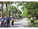 Bikers enjoying the recreational path along Pinellas Trail, a popular community amenity for exercise at 1345 Springdale St, Clearwater, FL 33755