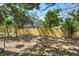 A fenced yard, plenty of shade from surrounding trees make it the perfect retreat at 1410 San Charles Dr, Dunedin, FL 34698