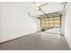 Spacious two car garage with a new garage door and plenty of storage space at 1410 San Charles Dr, Dunedin, FL 34698