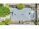 Aerial view of a home featuring a pool and roof at 1419 Trail Boss Ln, Brandon, FL 33511