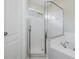 Bathroom showcasing a glass-enclosed shower, tub, and a modern sink at 1419 Trail Boss Ln, Brandon, FL 33511