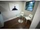 Bright dining area featuring a glass table, chairs, and natural light from the window at 1515 E 31St Ave, Tampa, FL 33610
