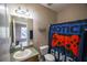 This bathroom features a single vanity, toilet, and a shower/tub combo at 15733 Fishhawk Falls Dr, Lithia, FL 33547
