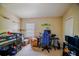 This bedroom features a bunk bed, chair, and a desk with gaming equipment at 15733 Fishhawk Falls Dr, Lithia, FL 33547