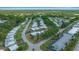 Wide aerial showcasing well-maintained community homes with lush landscaping and mature trees, neighborhood at 1805 Vera Pl # 2, Sarasota, FL 34235