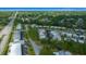 Scenic aerial perspective of a quiet residential neighborhood surrounded by mature trees at 1805 Vera Pl # 2, Sarasota, FL 34235