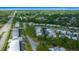 Expansive aerial shot displaying a residential neighborhood with mature trees and lush surroundings at 1805 Vera Pl # 2, Sarasota, FL 34235