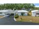 Charming single-story home with a carport, well-maintained lawn and tiled roof at 1805 Vera Pl # 2, Sarasota, FL 34235