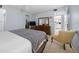 Tranquil bedroom with a bed, dresser, and relaxing atmosphere at 1805 Vera Pl # 2, Sarasota, FL 34235